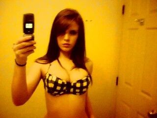 Young teen brunette has an amazing chest