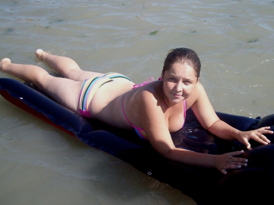 Chubby mother and her busty daughter on the beach