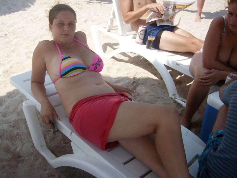 Chubby mother and her busty daughter on the beach