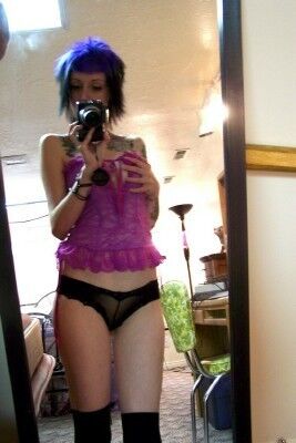 Perky-titted emo brunette taking mirror-shots