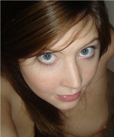 Cute young redhead with perfect tits