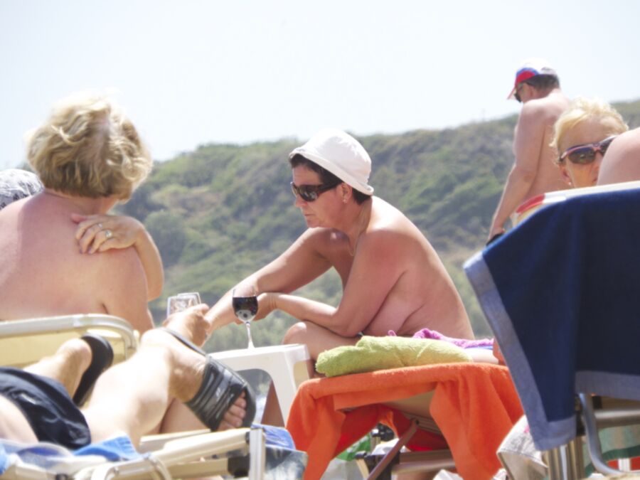 Mature with bob caught topless, Agia Marina, Creta