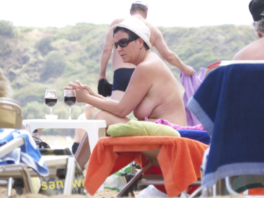 Mature with bob caught topless, Agia Marina, Creta