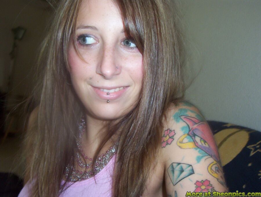 Sexy Pierced and Tattooed Babe