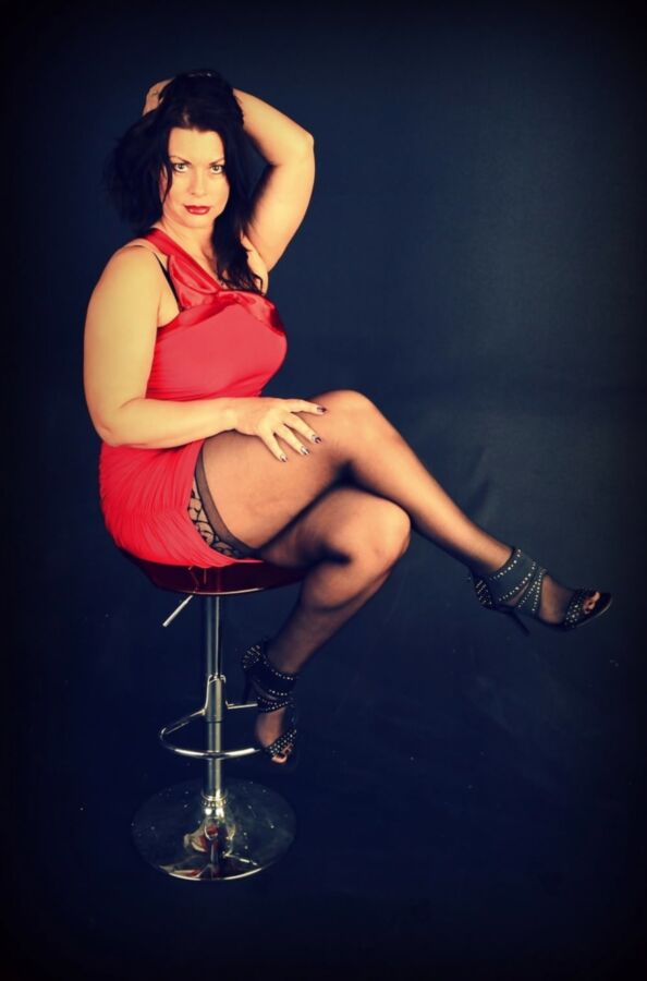 Raven-Red Dress And Black Stockings