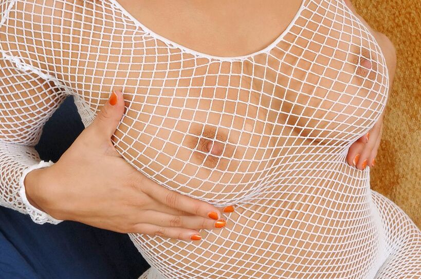 Busty babe Mia in white fishnet