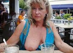 Granny Flashing Her Big Titties