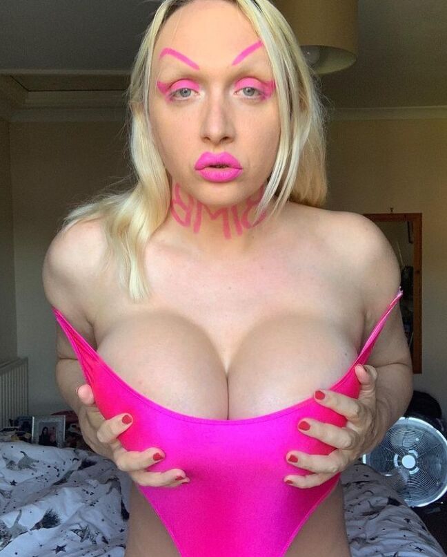 Dolly D.Deluxe/dollybluesky: Silicone titted Blonde Tranny Bimbo