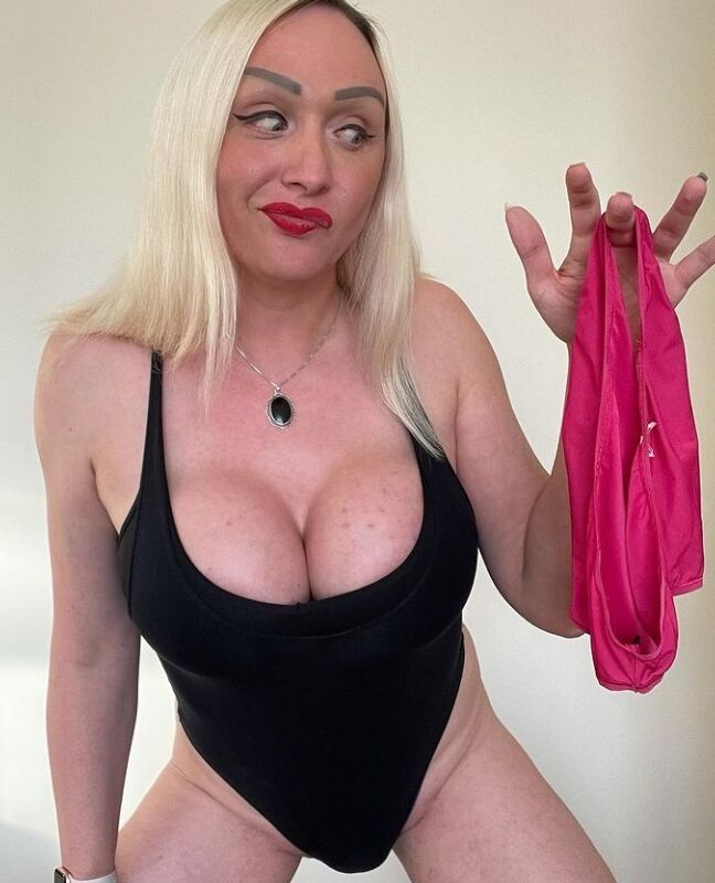 Dolly D.Deluxe/dollybluesky: Silicone titted Blonde Tranny Bimbo