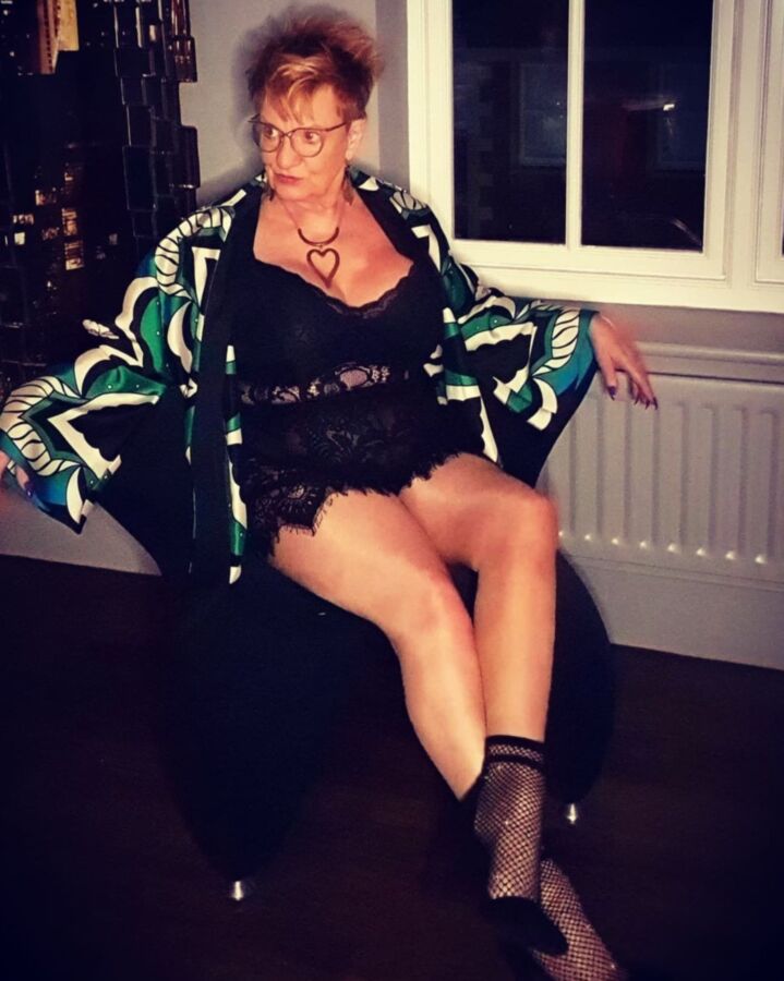 Nice and Sexy Granny with Beautiful Legs and Big Tits