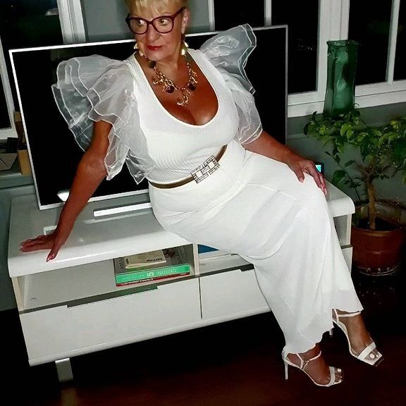 Nice and Sexy Granny with Beautiful Legs and Big Tits