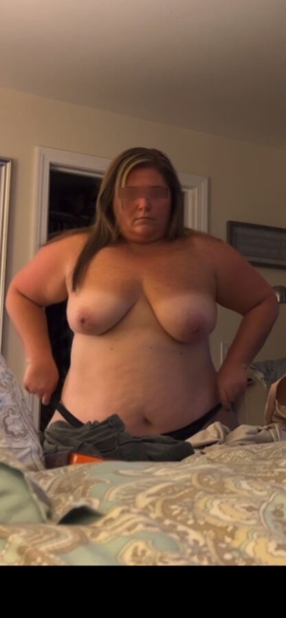 BBW wife shows off DD tits