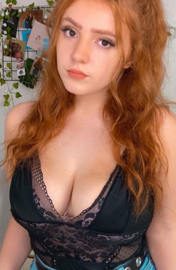 Busty young redhead Brit