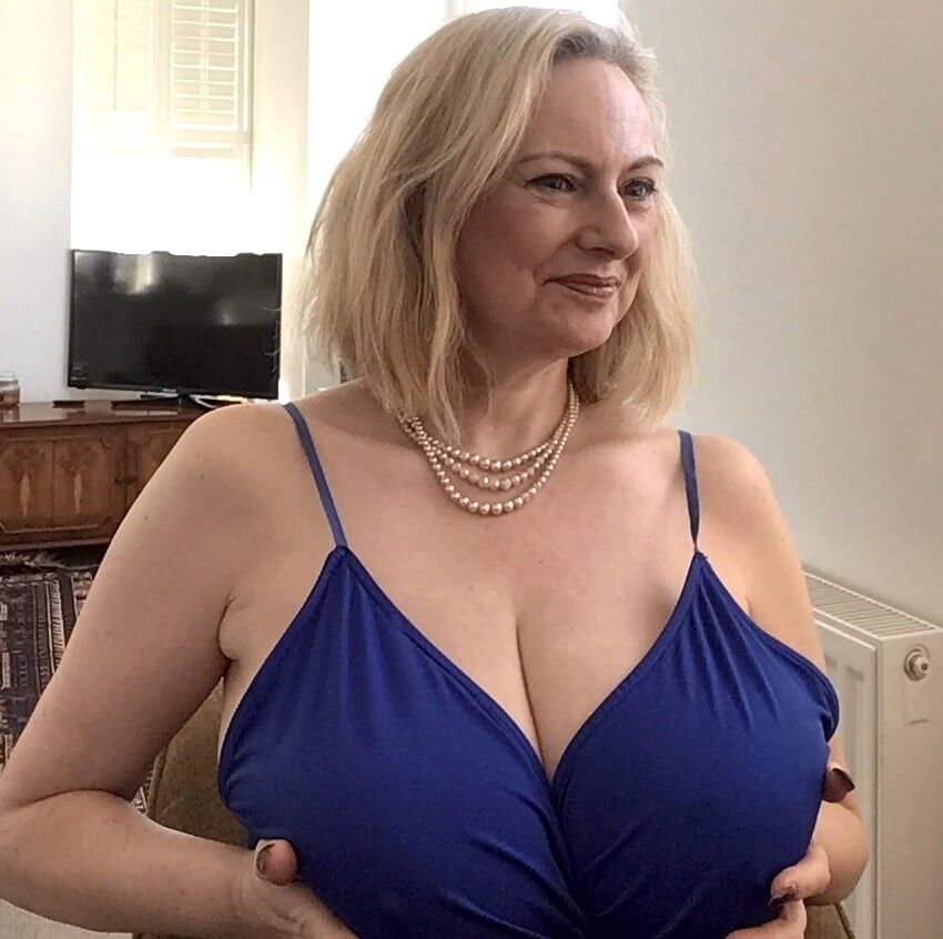 Classy mature with superb tits