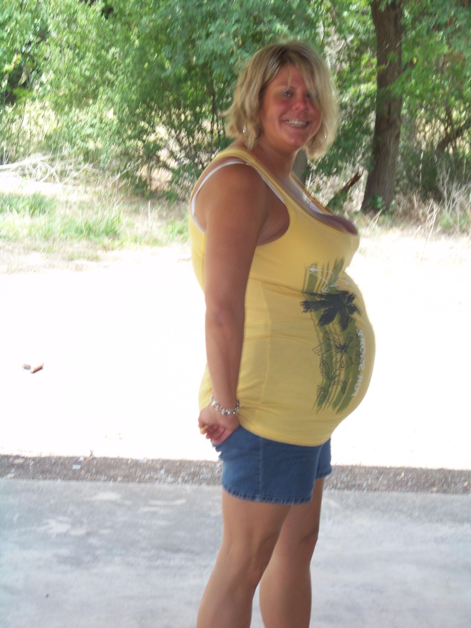 hot preggo milf with big belly and hangers