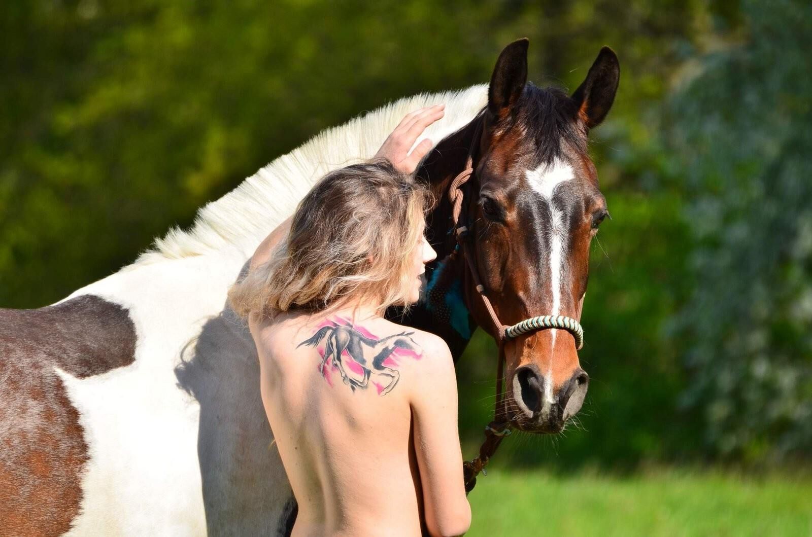 Girl riding her Horse Topless