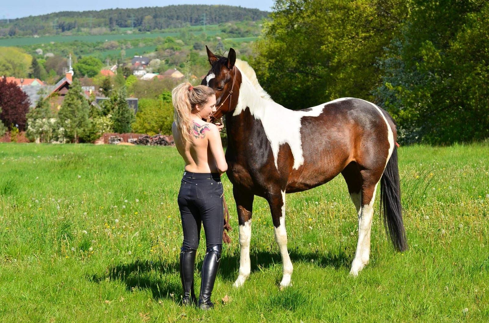 Girl riding her Horse Topless