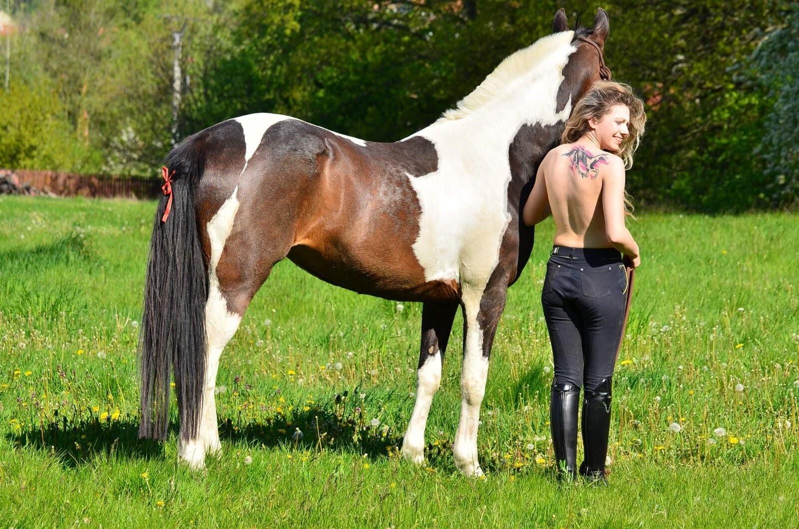 Girl riding her Horse Topless