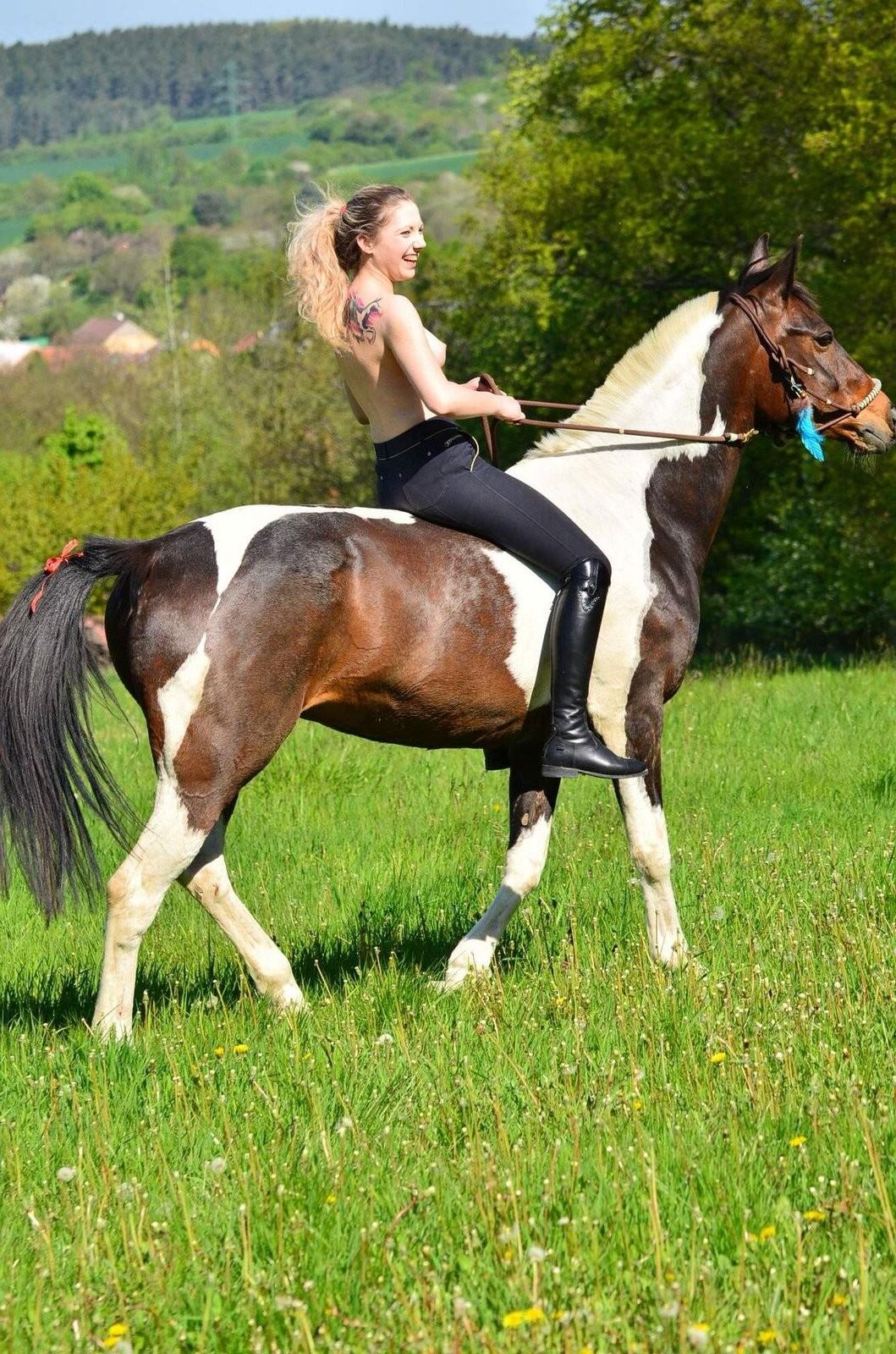 Girl riding her Horse Topless