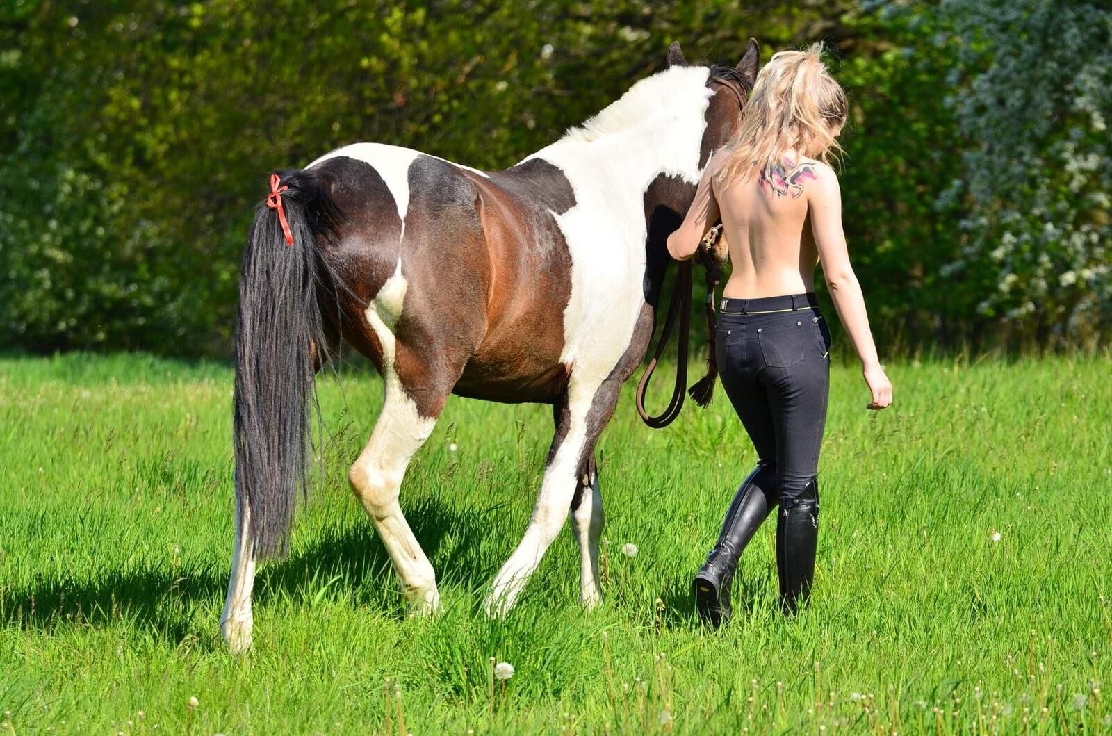 Girl riding her Horse Topless