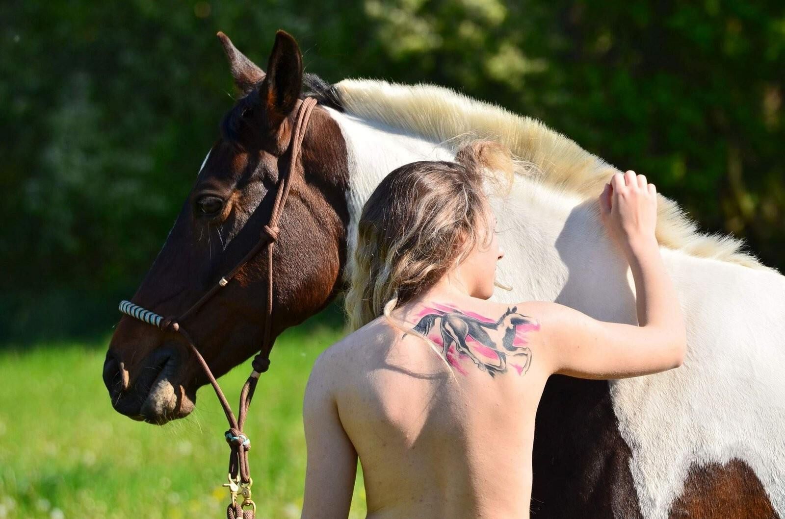 Girl riding her Horse Topless