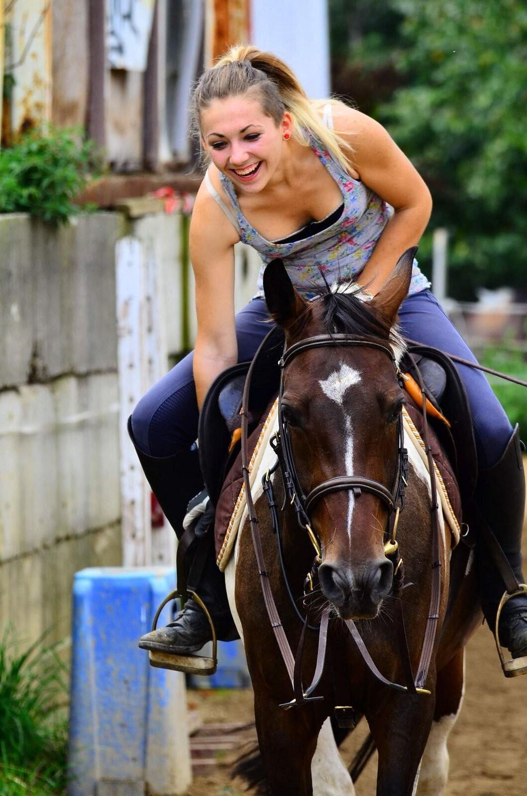 Girl riding her Horse Topless