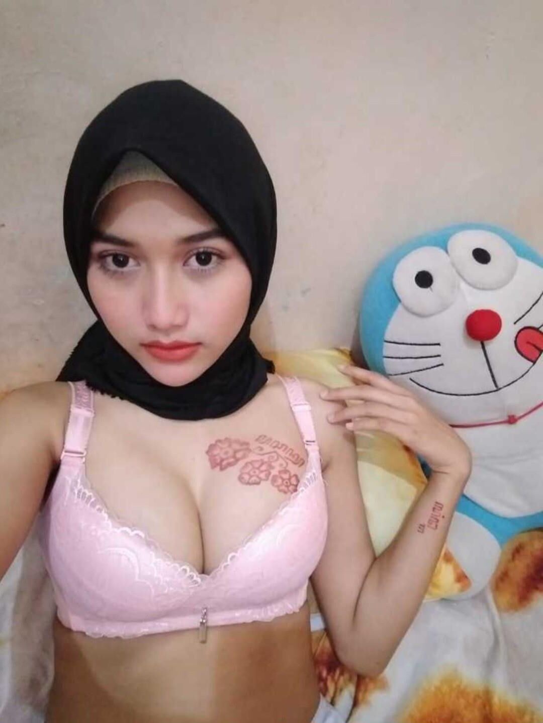 Busty Hijab Wearing Indonesian