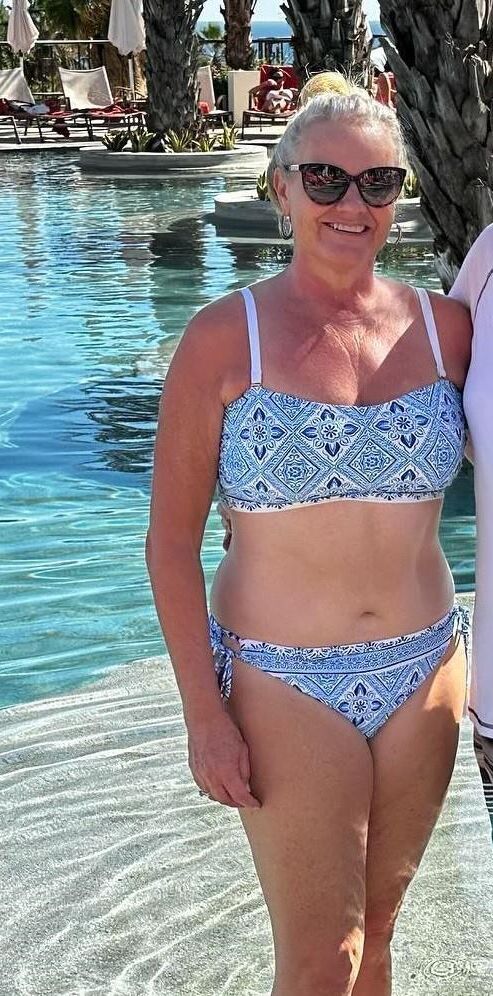 Buxom MILF Tricia . Bikinis , Dresses, Cleavage . Cute. Sexy