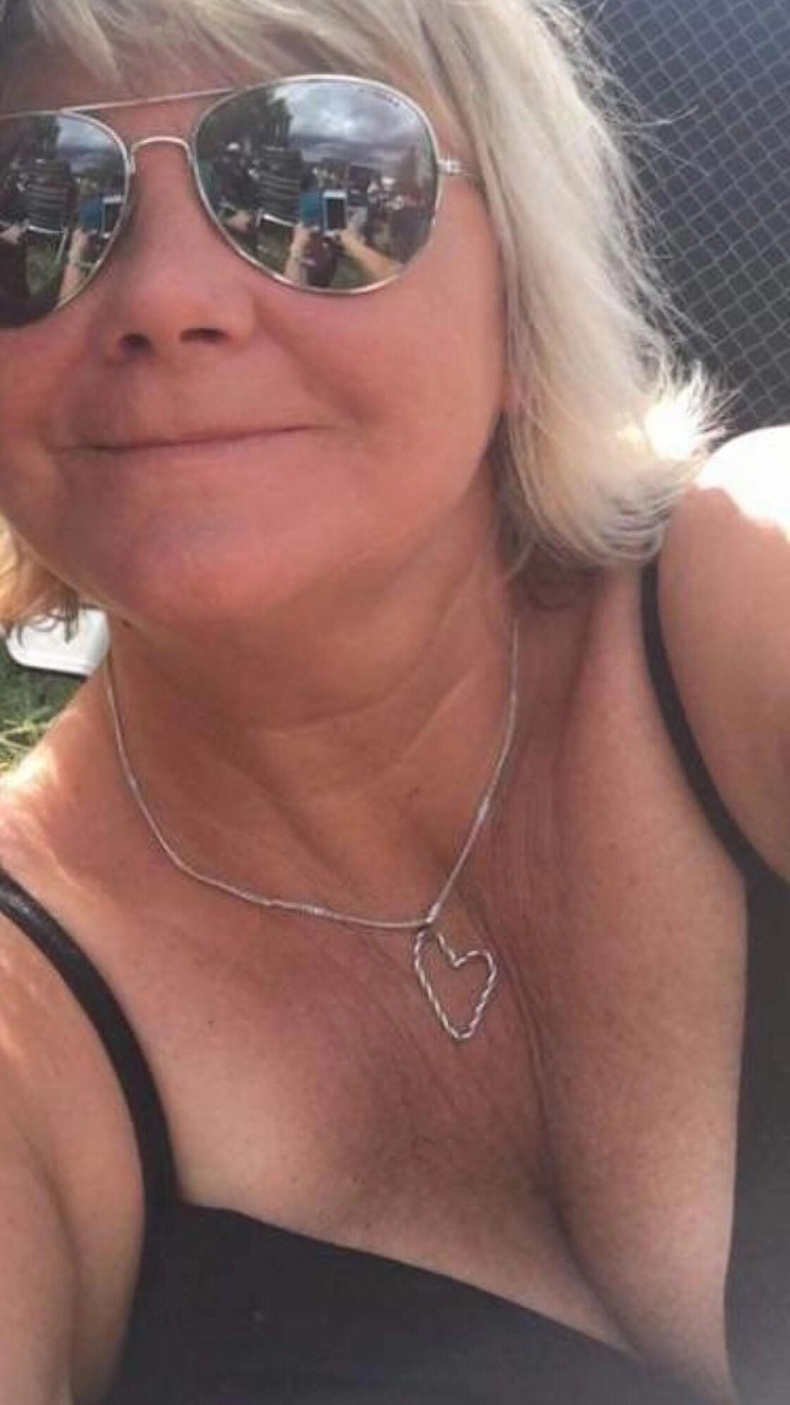 Reife MILF mit großen Titten