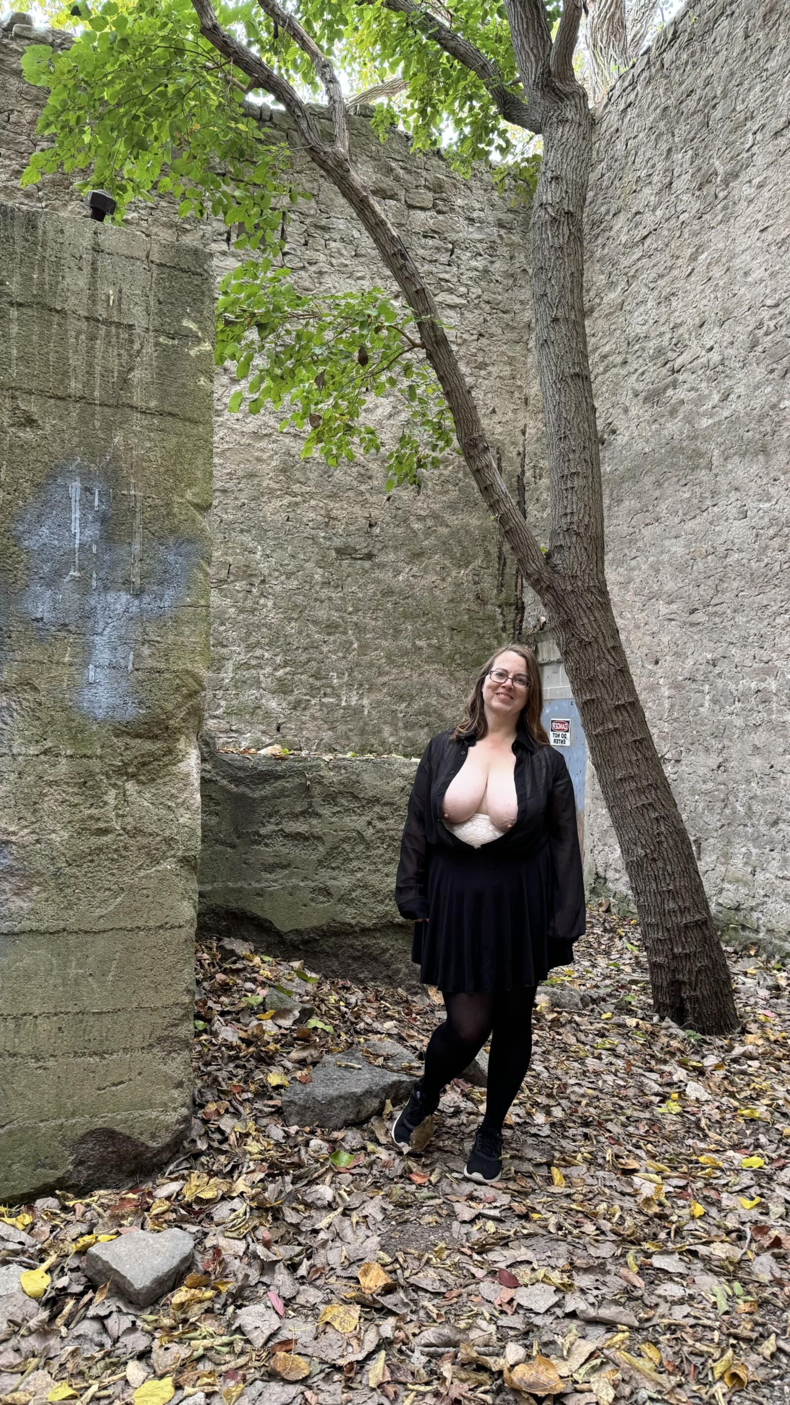 My Hotwife shows her gorgeous globes in an abandoned quarry bui.