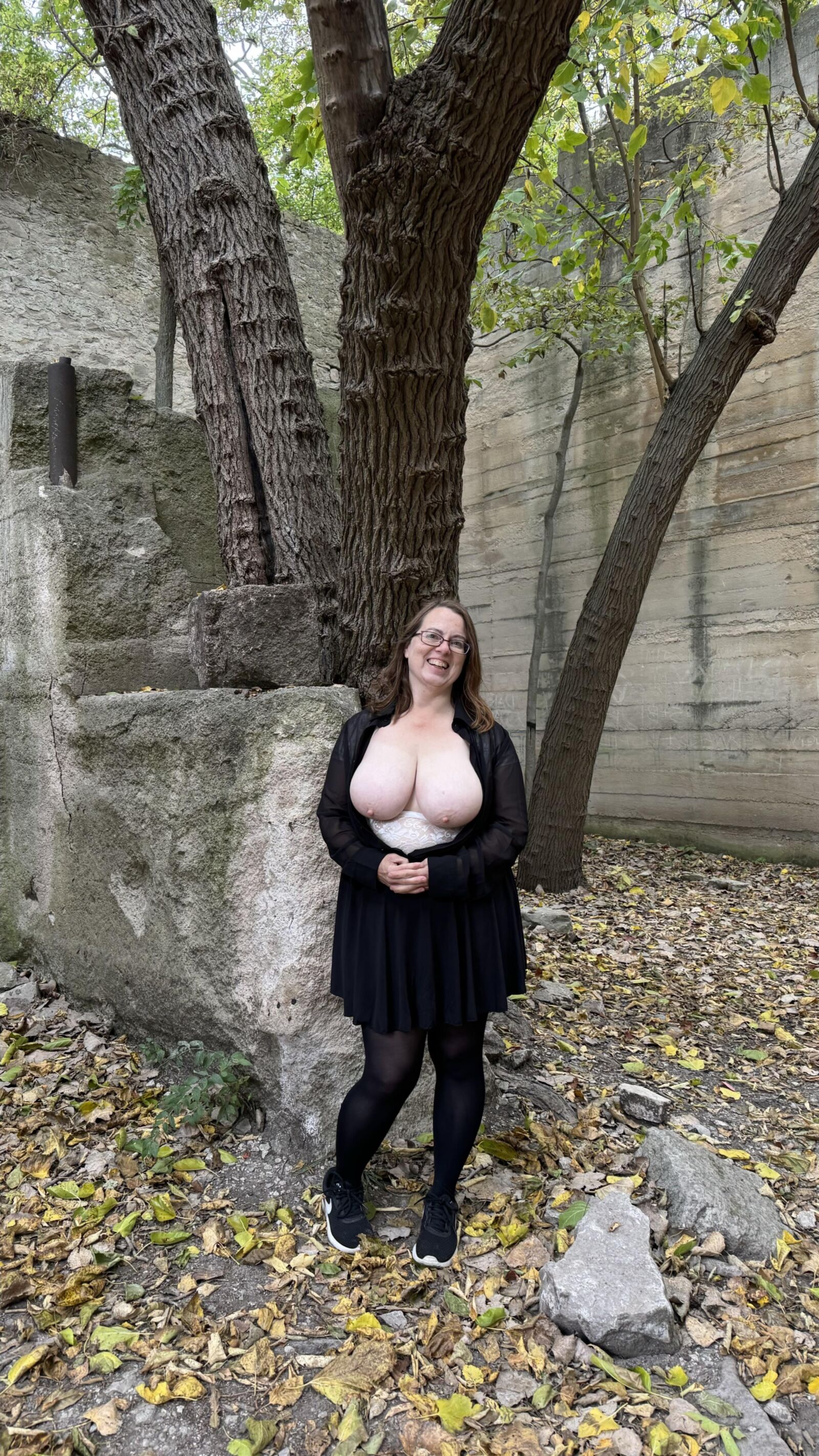 My Hotwife shows her gorgeous globes in an abandoned quarry bui.