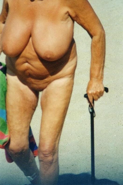 Dusty Old Pics of a Nudist Granny with HUGE TITS!