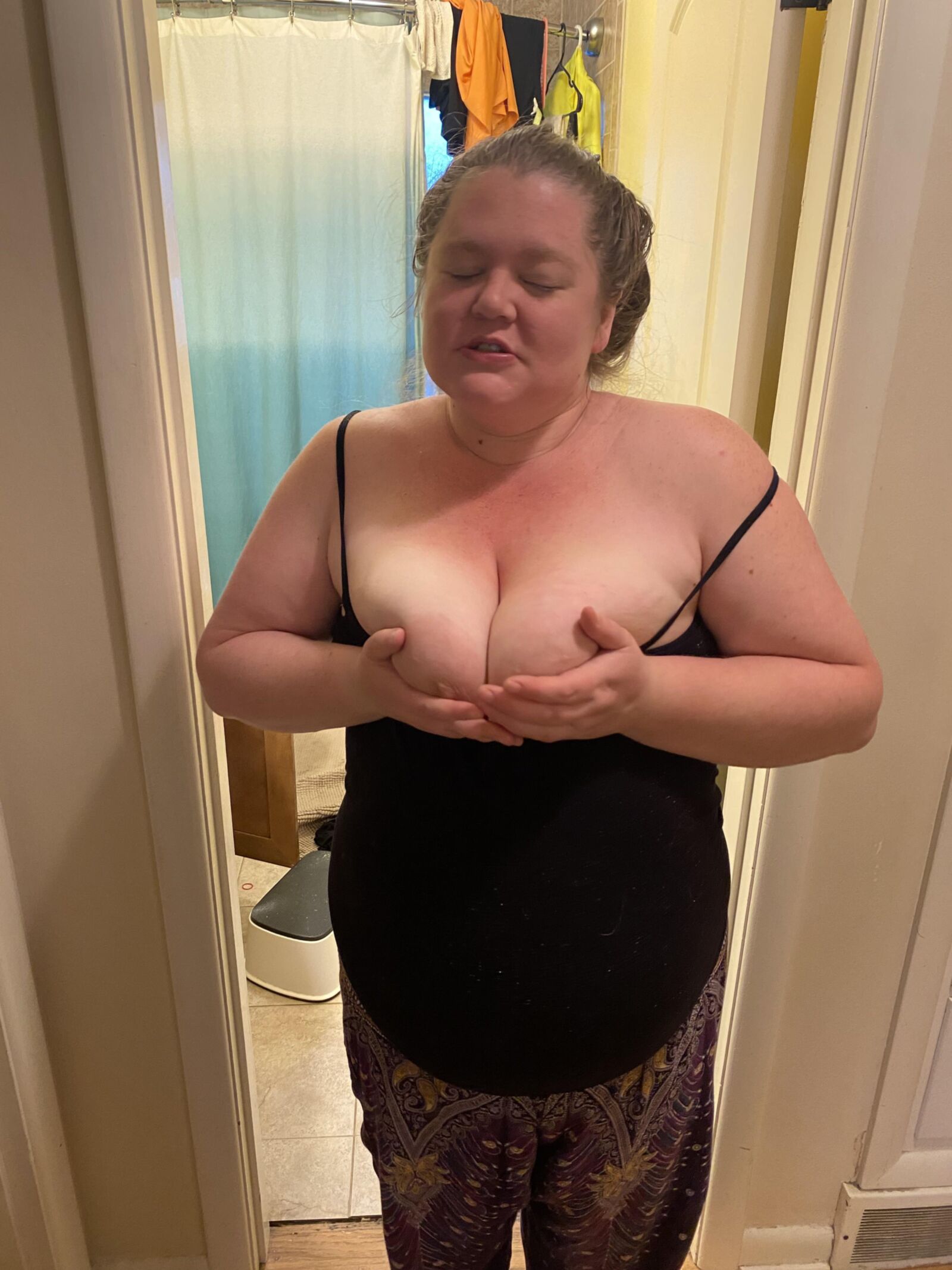 Tits out in the hallway