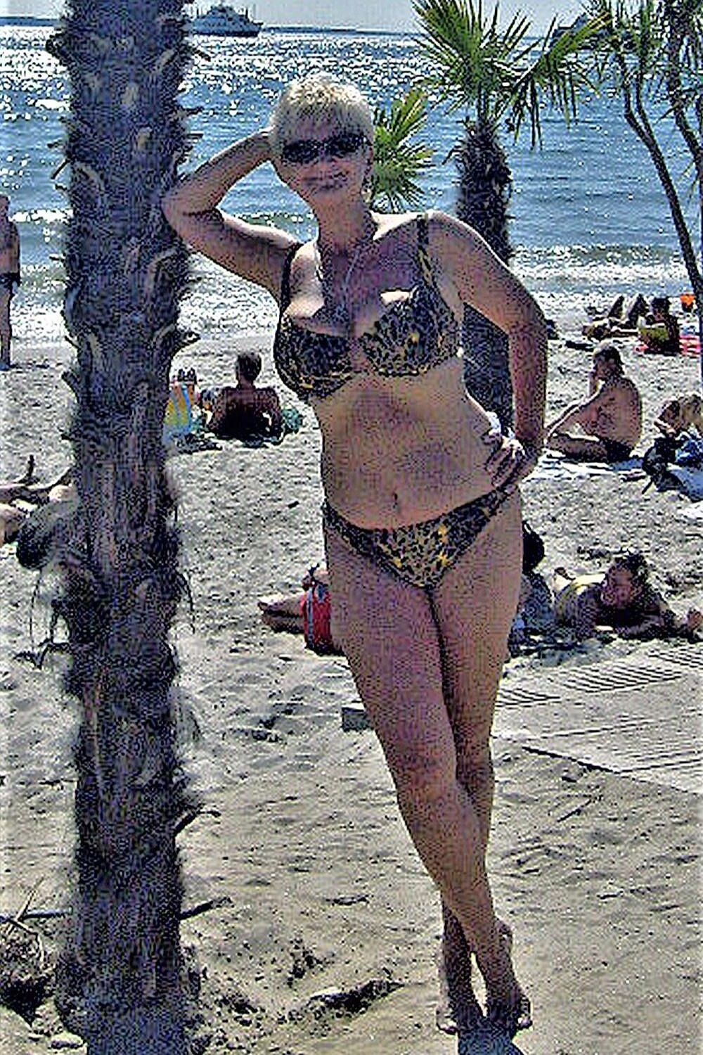 Posing in tiger bikini