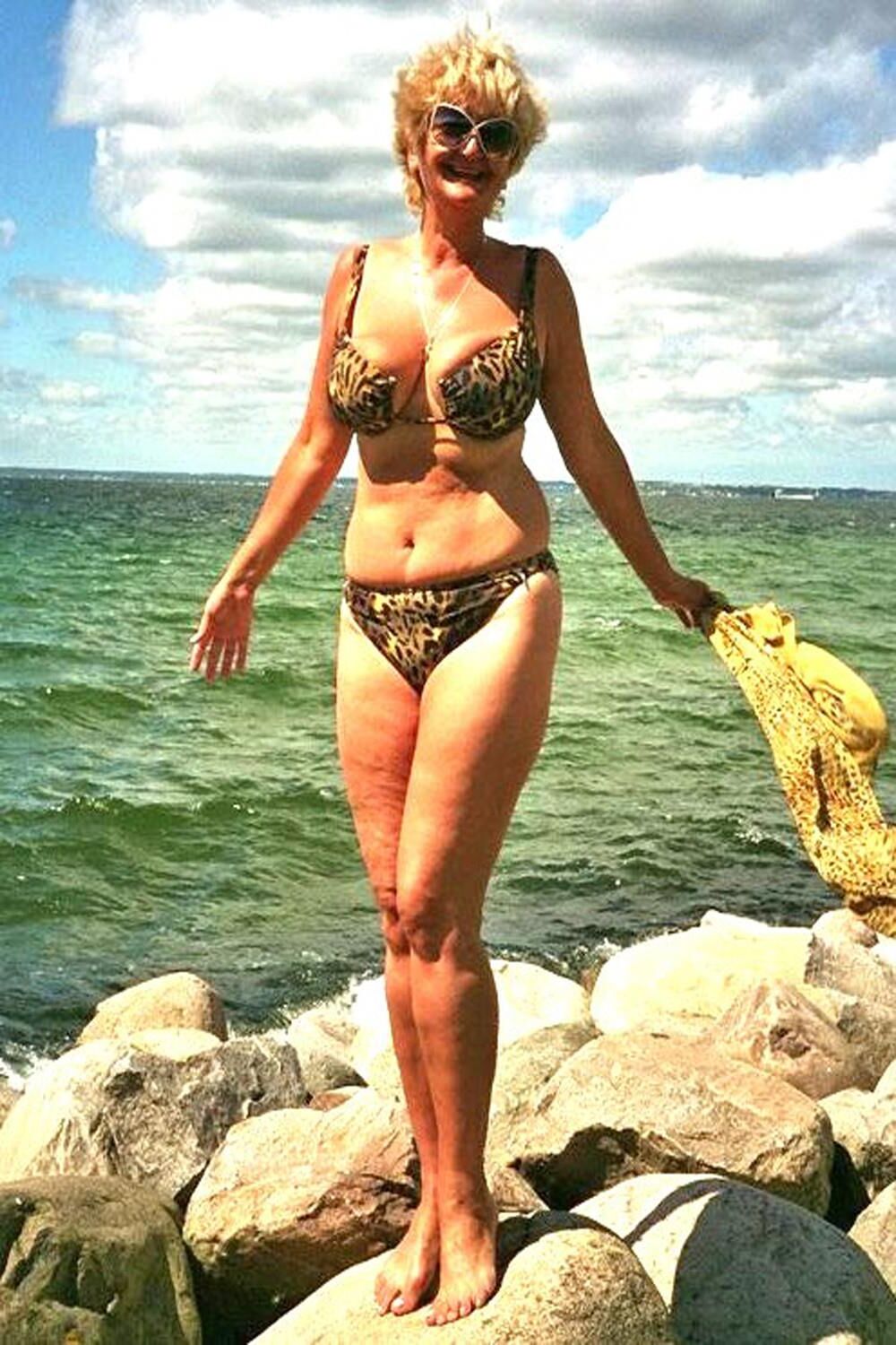 Posing in tiger bikini