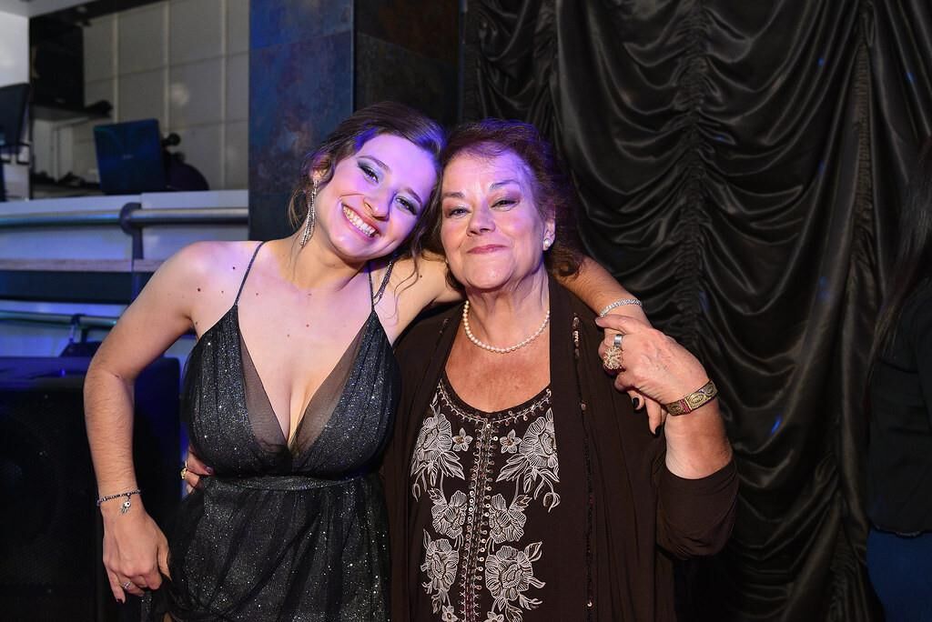 mom or daughter at the party?