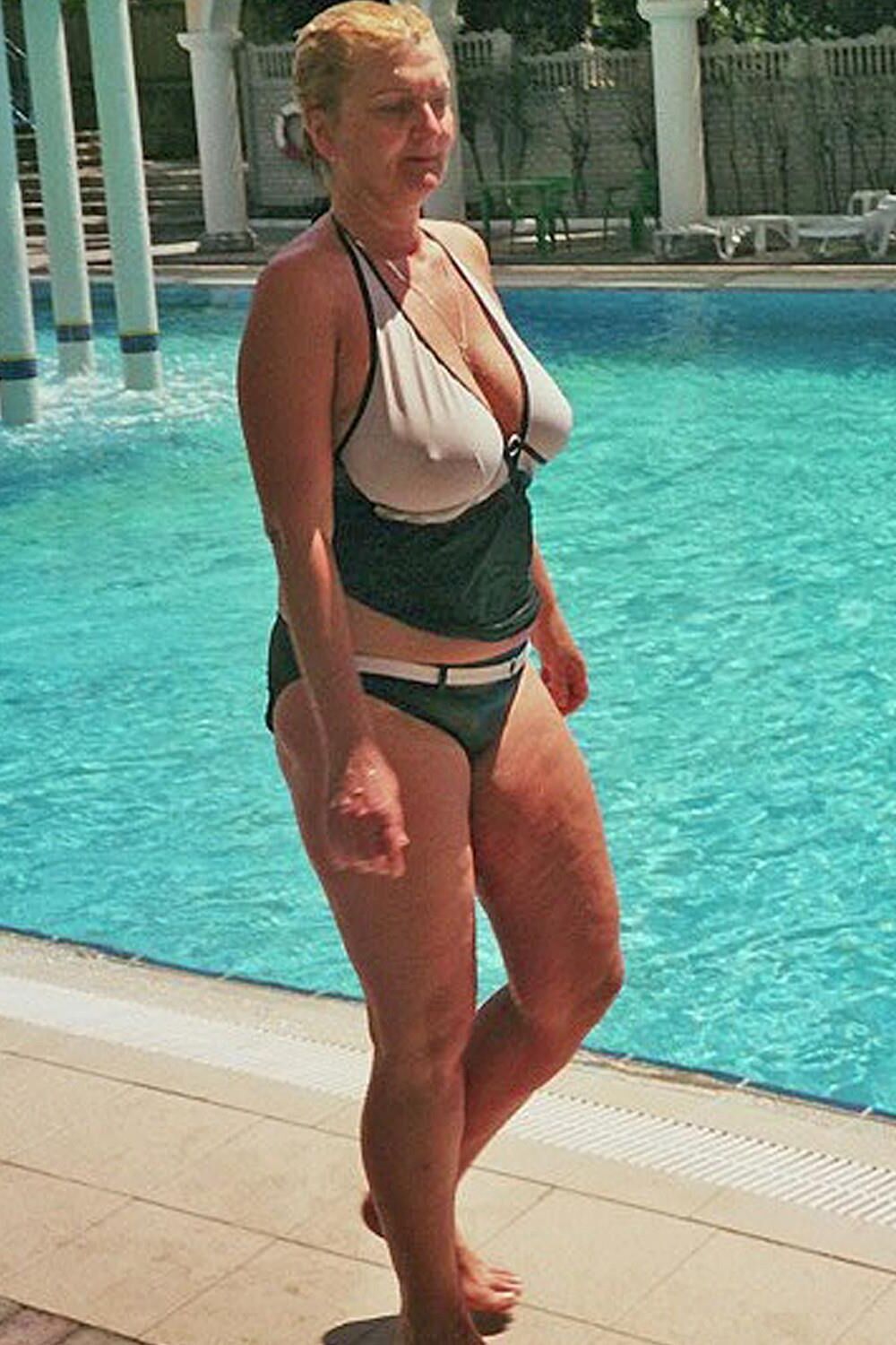 Posing in black and white bikini/swimsuit