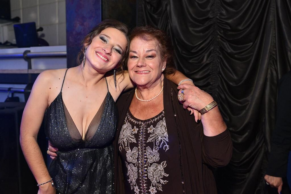 mom or daughter at the party?