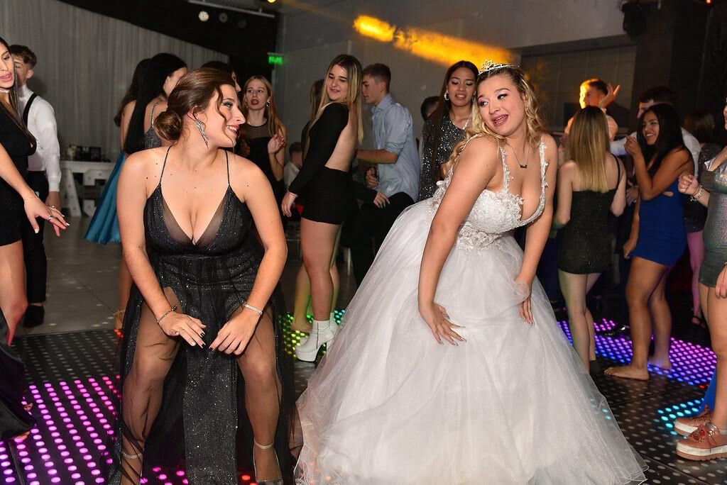 mom or daughter at the party?