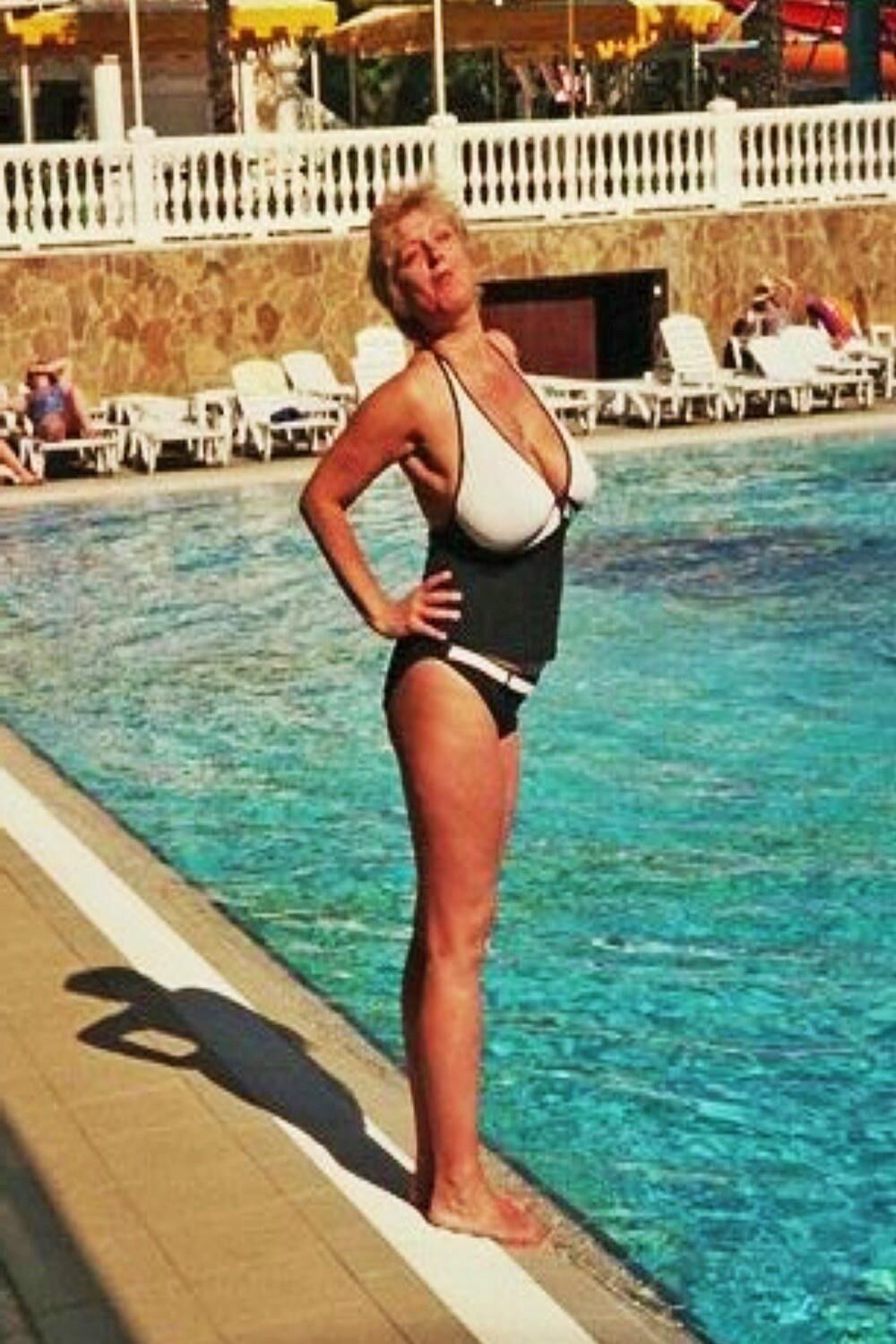 Posing in black and white bikini/swimsuit