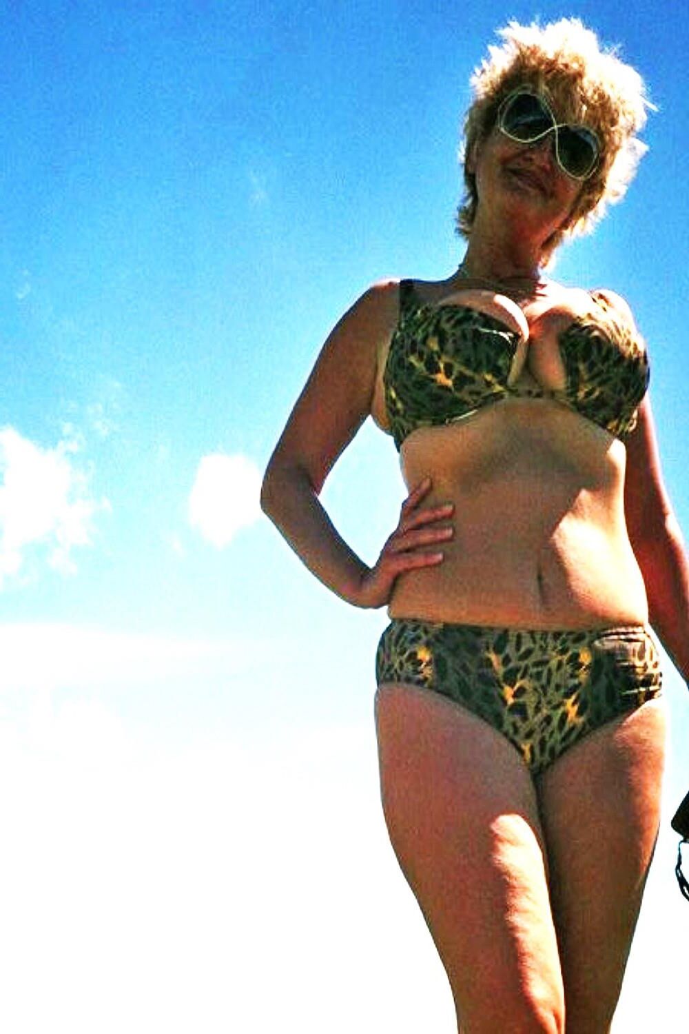 Posing in tiger bikini