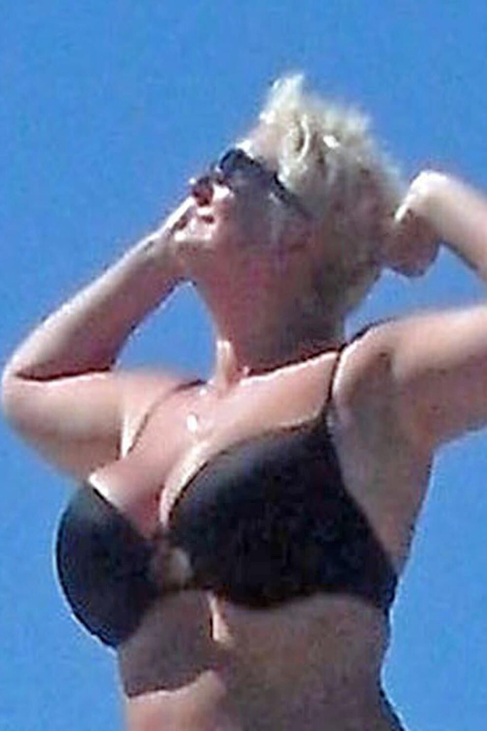 Posing in black bikini