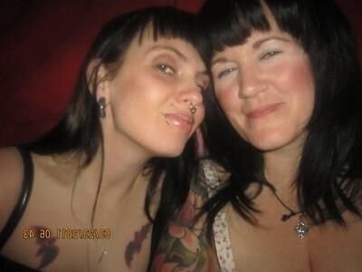 Bigtitted brunette with arm tatoo