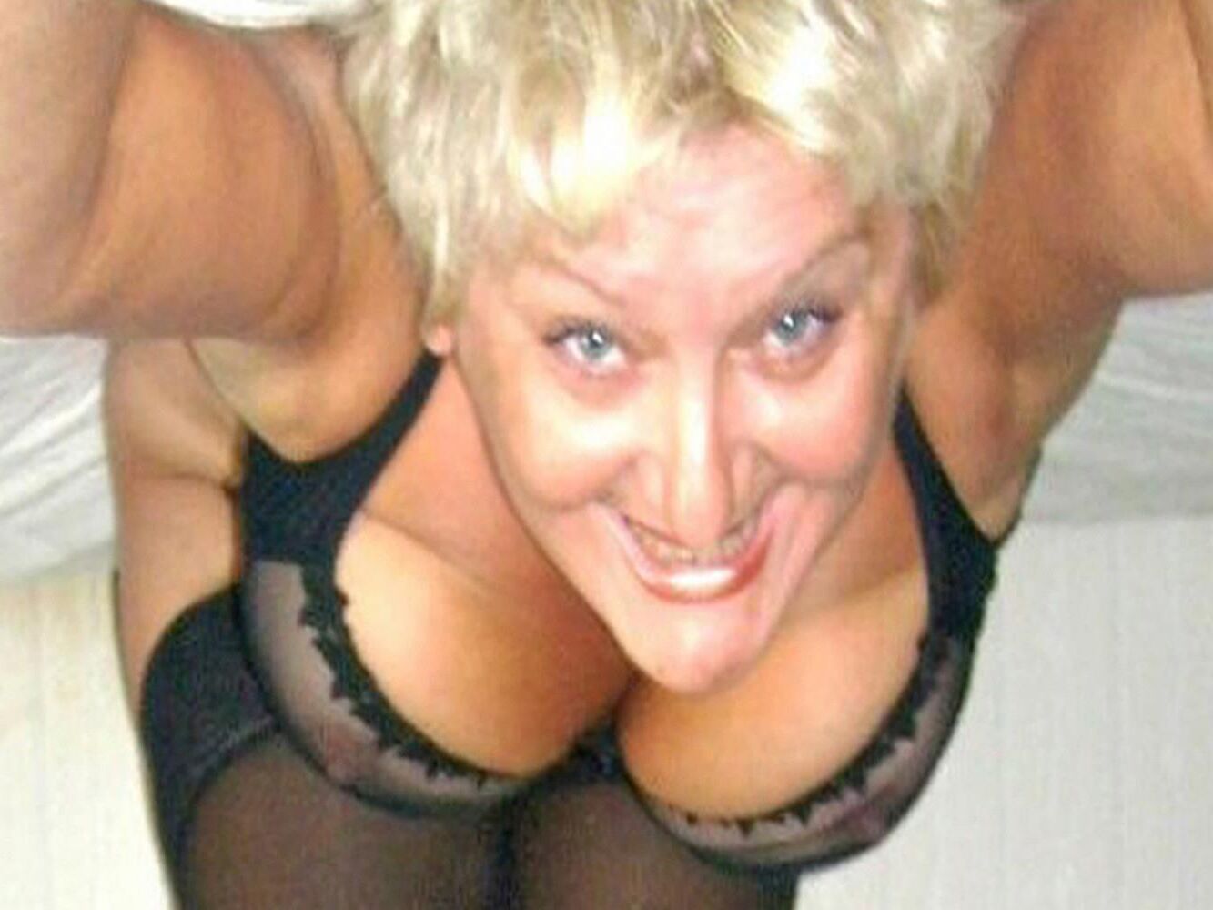 Posing in black lingerie