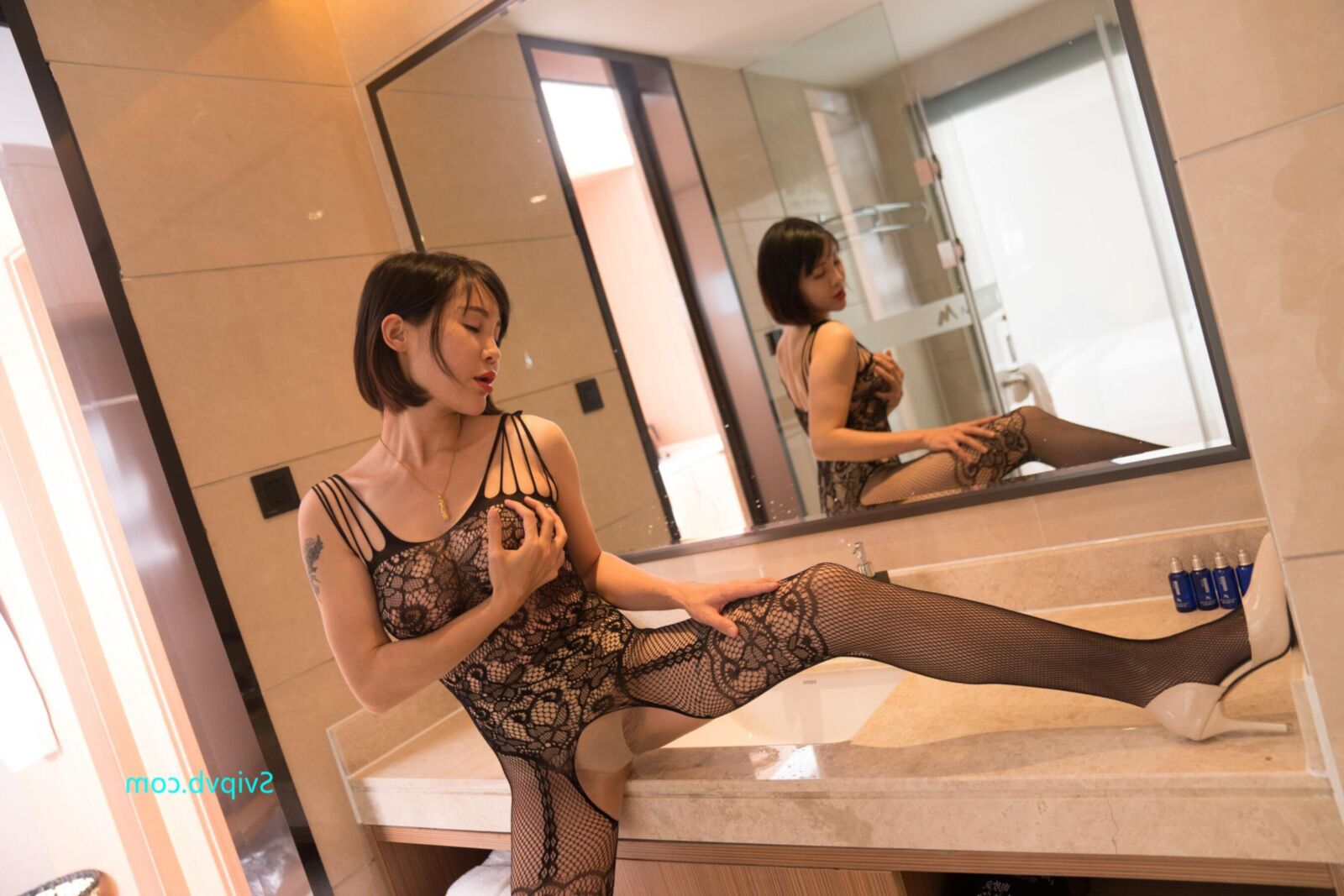 Orange Attractive Chinese Milf in a Sexy Black Bodystocking