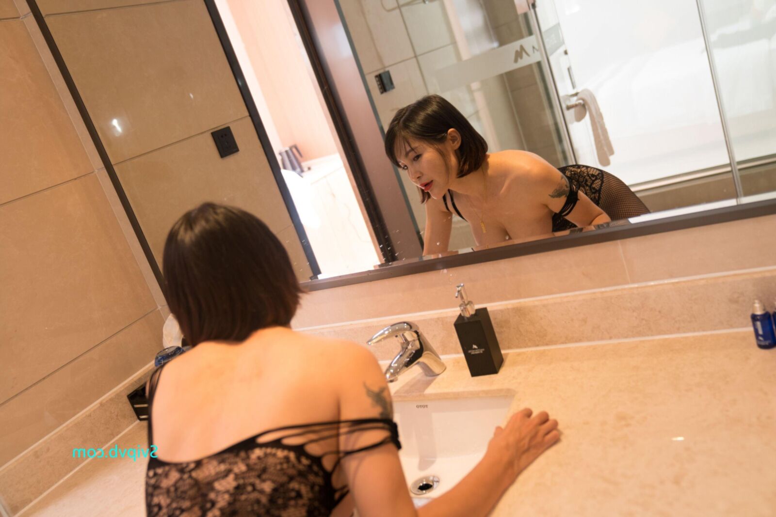 Orange Attractive Chinese Milf in a Sexy Black Bodystocking