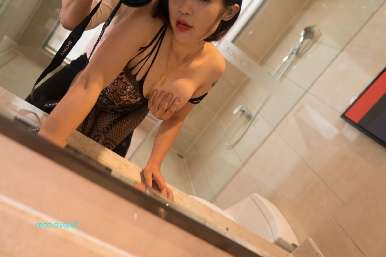 Orange Attractive Chinese Milf in a Sexy Black Bodystocking