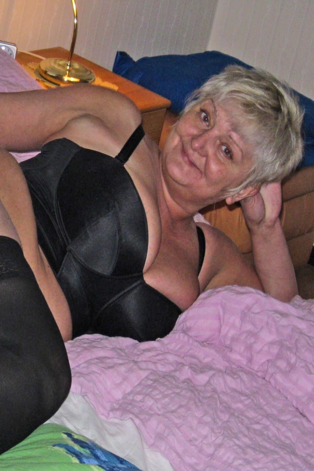 Posing and masturbating