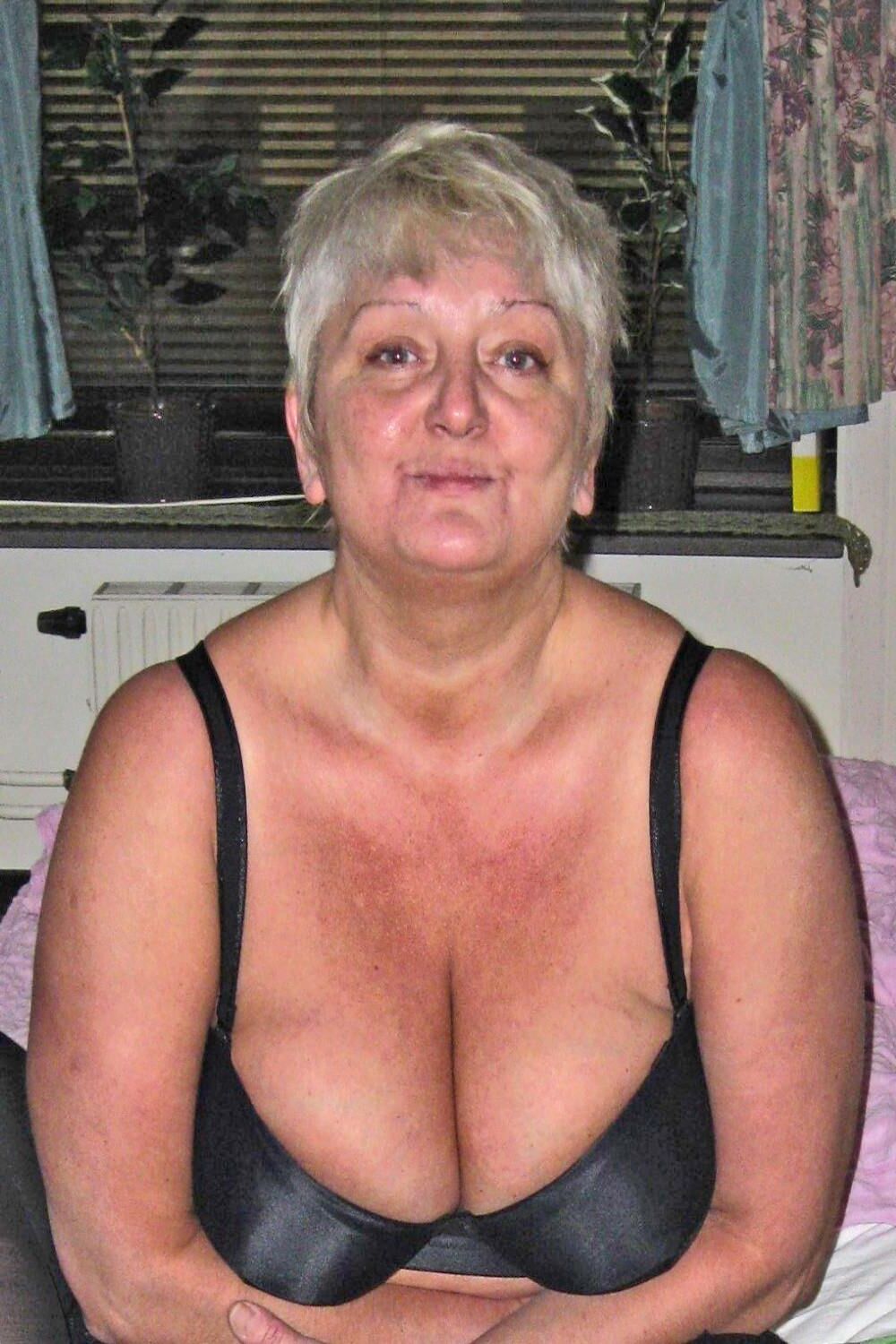 Posing and masturbating