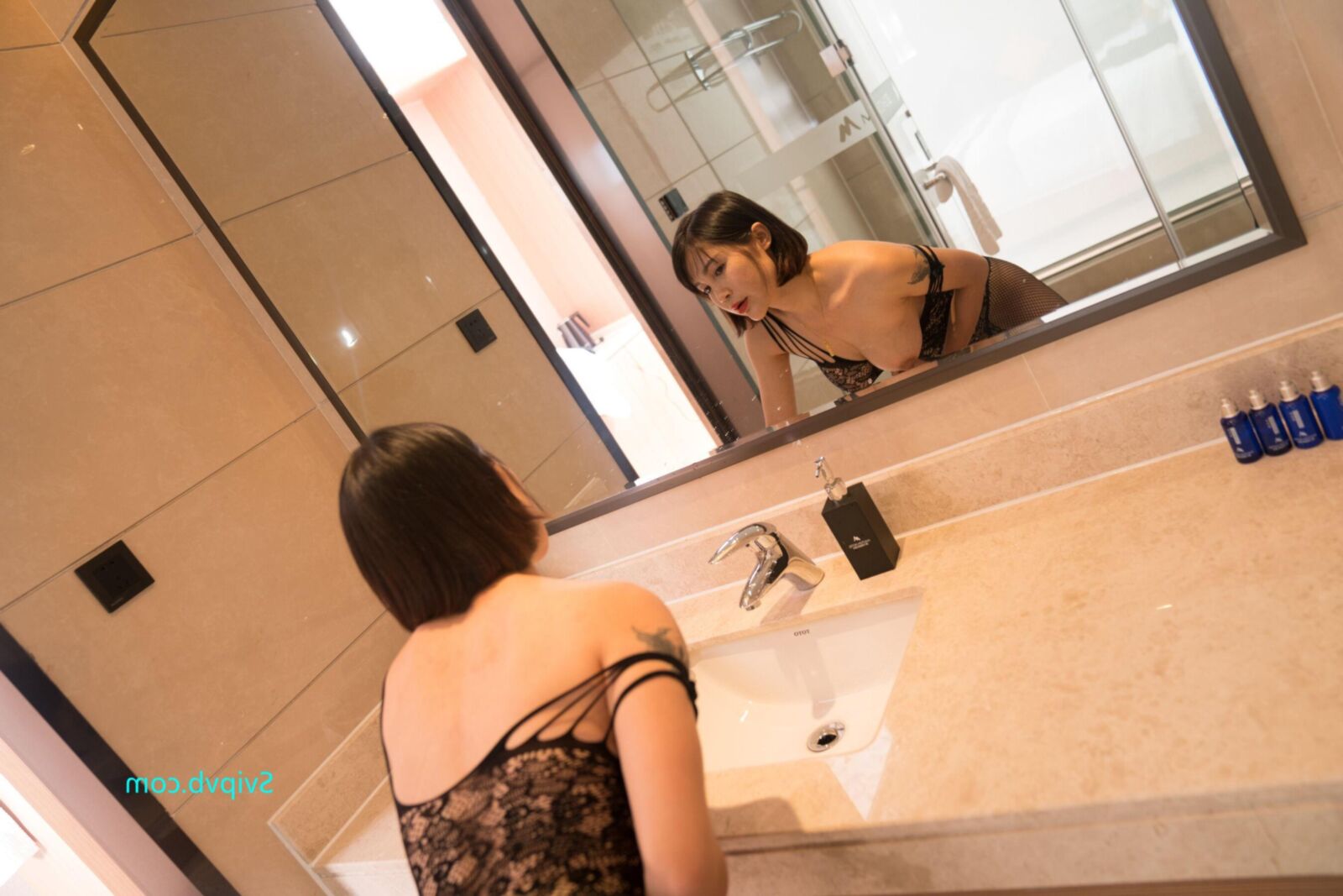 Orange Attractive Chinese Milf in a Sexy Black Bodystocking